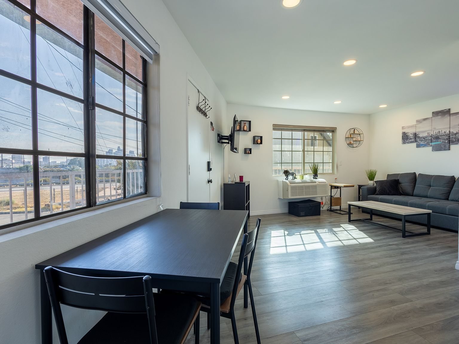 Dining table beside the open living area in Apartment A